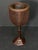 A fine English plant stand or jardiniere from the Edwardian era, featuring a cane (wicker) basket with a goblet or...