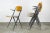 This set of four Pyramid chairs with armrests was designed by Dutch designer Wim Rietveld for Ahrend de Cirkel in 1963....