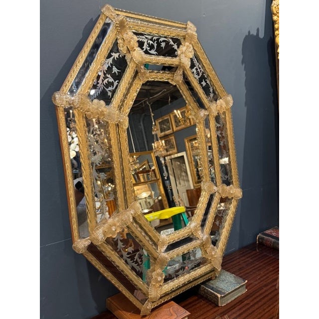 Vintage Italian Murano Glass Octagonal flower mirror. These mirrors combine the classic octagonal Venetian form with...