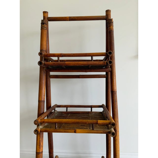 Fantastic folding bamboo etagere that will fit into a beach, country or traditional decor scheme. This 51” tall shelving...