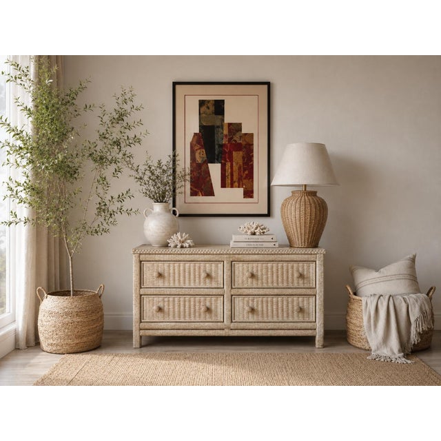 Beautiful vintage dresser by Henry Link featuring an organic coastal design with woven wicker construction in a soft...