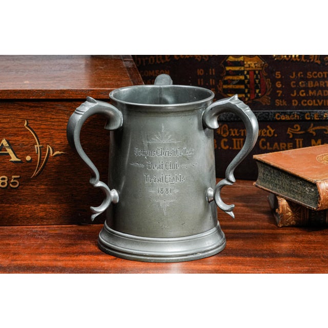This remarkable English Victorian pewter tankard is an exceptional example of late 19th-century sporting presentation...