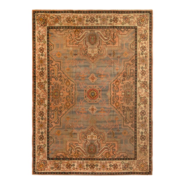 Hand Knotted Antique Oushak Style Rug in Blue and Pink Medallion Style For Sale