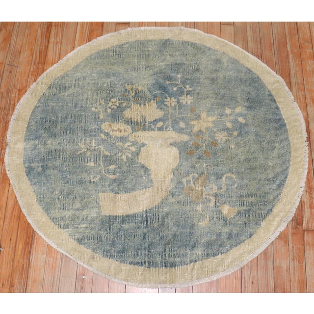 An early 20th century Chinese Art Deco mini round rug. 3'6'' x 3'10''
