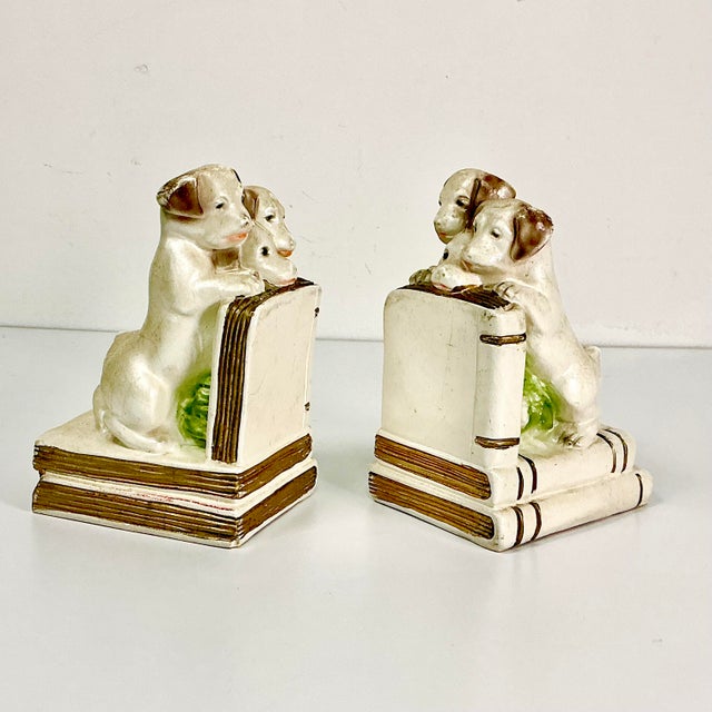 Theses are adorable and oh so whimsical. We have a pair of antique Bookends. Each features three dogs up on their hind...