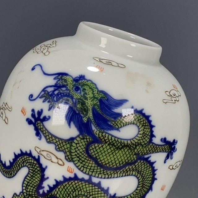 This stunning Chinese‑style lidded porcelain ginger jar brings classic Chinoiserie charm to your interior. The jar...