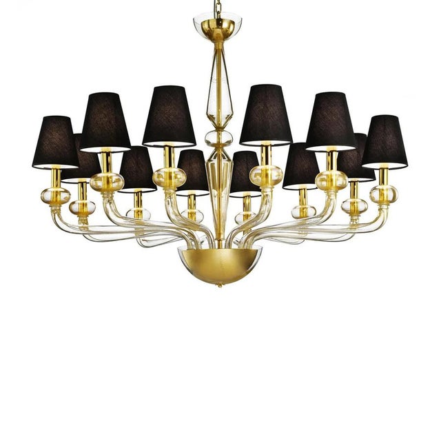 Contemporary luxury italian chandelier in Murano glass. Elegant chandelier blowing in transparent Murano glass full of...