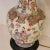 Famille Rose Chinese lamp with new black silk bell shaped shade. Famille rose is an 18th century Chinese porcelain,...