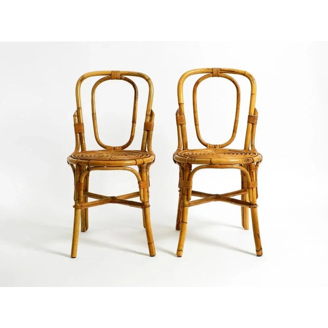 A pair of beautiful, rare, original 1960s bamboo chairs. Beautiful design and very comfortable to sit on. Made in Italy....