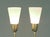 The designers of these lamps certainly were tuned into the spirit of their moment! The decorated elements positively exude...