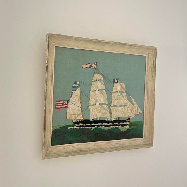 A striking and highly decorative example of American coastal folk art, this large-scale crewel embroidery depicts a...