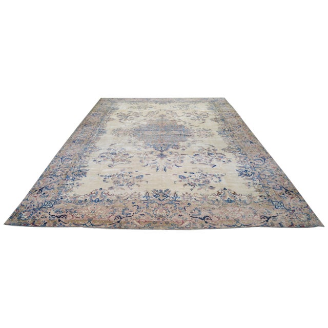 Vintage Hand-knotted with care using traditional rug-making techniques, this wool rug blends timeless craftsmanship with a...