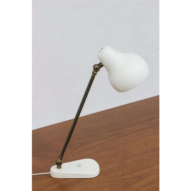 Table lamp designed by Wilhelm Lauritzen. Produced by Louis Poulsen in Denmark ca 1940s. The model was designed for the...