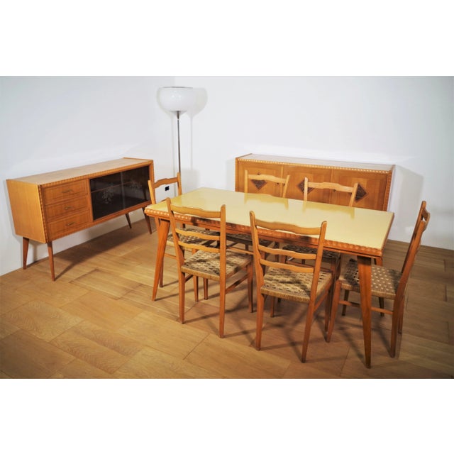 Set lounge table and 6 chairs, sideboard in beech, rosewood and maple. beech, rosewood and maple by melchiorre bega and...