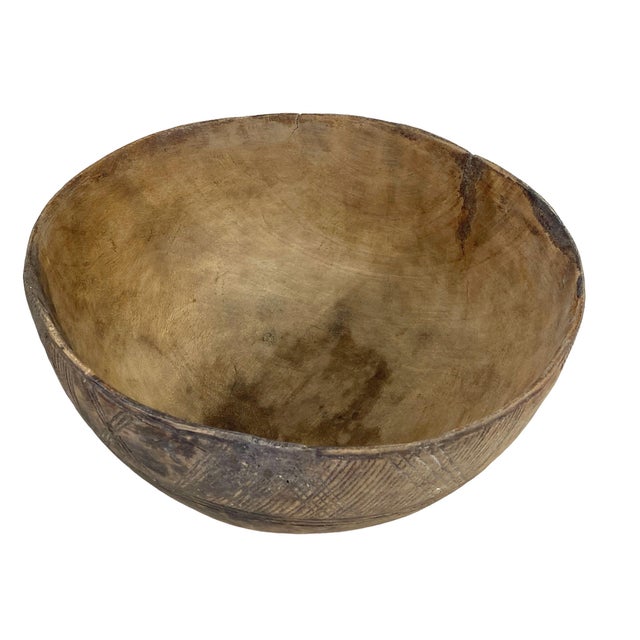 Hand carved by the Hausa Niger nomads, these decorative wooden bowls are a one-of-a-kind piece of Saharan art. Durable...