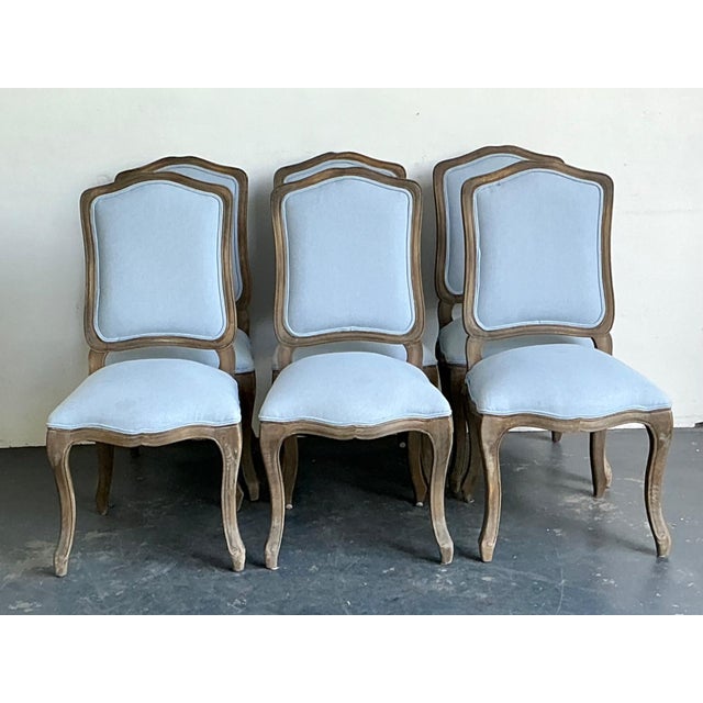 This elegant set of six vintage dining chairs combines timeless craftsmanship with refined traditional styling. Expertly...