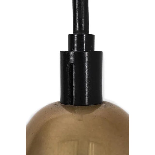 Lisa johansson-pape pendant in matt golden colour. Produced in the 50’s by stockmann – orno from finland. A very...