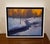 In "Winter Solace," a tranquil winter landscape unfolds with a meandering stream cutting through a blanket of snow. The...