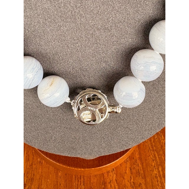 Mid Century Blue Lace Agate Necklace. 12mm - 17” inclusive of Sterling Silver Clasp Item has been unworn and is in...