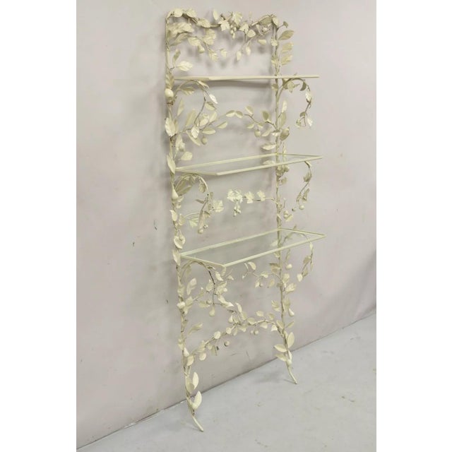 Vintage Italian Hollywood Regency Iron Tole Metal Fruit Vine Wall Hanging Shelf. Item features 3 glass shelves, maple leaf...