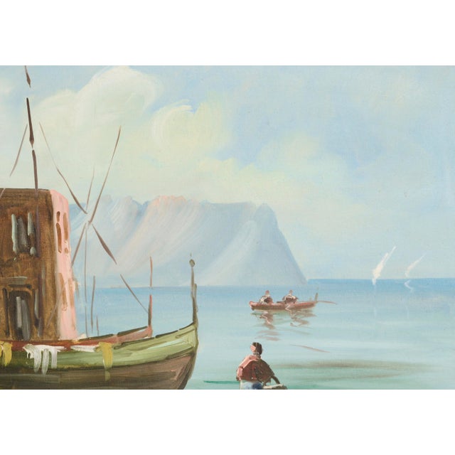 Italian seascape of fishing boats and the shore with ocean cliffs in the background by an unknown artist. Signed...