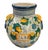Bring the sun-drenched romance of the Mediterranean indoors with this striking vintage Italian Majolica-style ceramic urn....