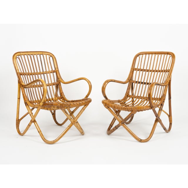Mid-Century amazing pair of armchairs in rattan and bamboo bent in the style of Tito Agnoli. Made in Italy in the 1960s....