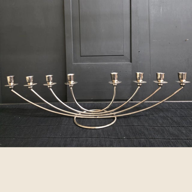 vintage chrome candelabra with sleek minimalist lines and modernist symmetry. Measuring an impressive 29 inches long, this...