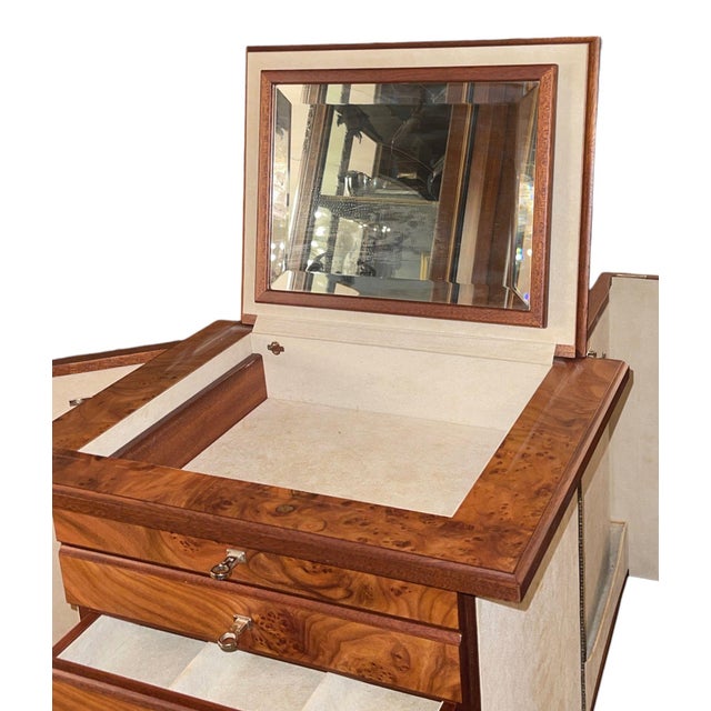 An exceptional Italian floor-standing jewelry armoire by Agresti of Florence, from the celebrated “Lo Scrigno” collection....