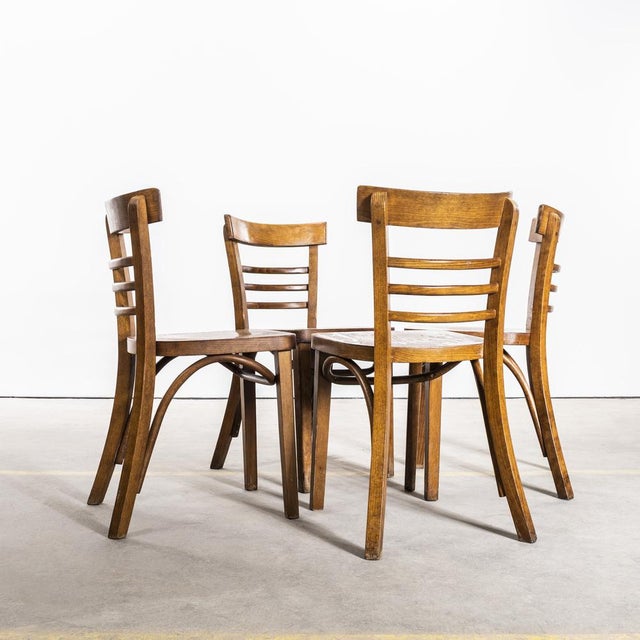 1960’s Ladderback Mid Oak Bentwood Dining Chairs. Good quality classic bentwood chairs with a typical 60’s deep dark oak...