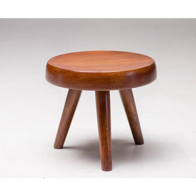 Original low stool or tabouret, known as the Berger Stool, designed by Charlotte Perriand. Inspired by pastoral mountain...