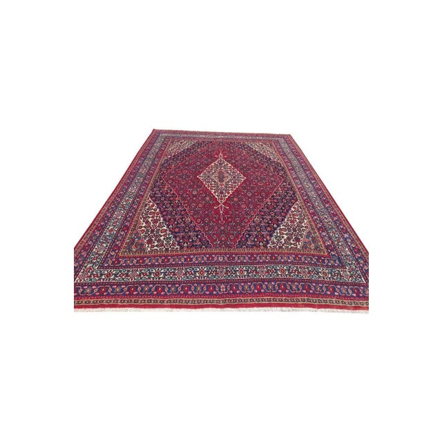 Size: 12'0'' x 9'0'' Age: 30-40 Years SKU: 2637 KHI-7 Material: 100% Wool Experience the timeless beauty of this authentic...