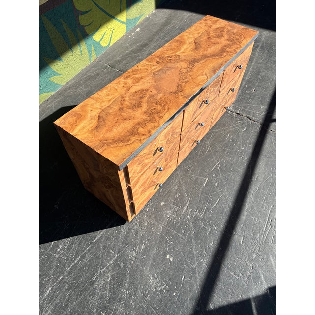 Burl is always in style and really makes a statement in any setting. This postmod niner is no exception. Can be utilized...