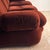 An elegant Italian-made three-seater sofa dating back to the 1970s, featuring a soft, enveloping design typical of the...