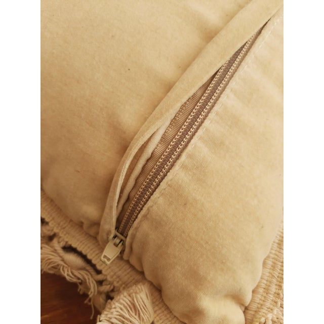 Soft tones of pink, sage green, and oatmeal beige create a beautiful palette. The item features a velvet backing and...