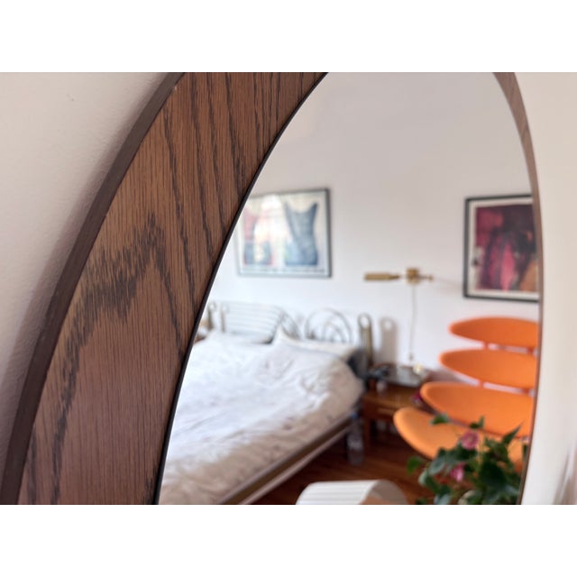 A large Scandinavian mirror from the 1960s. In original and very good condition. The mirror diameter is 94 cm. The mirror...