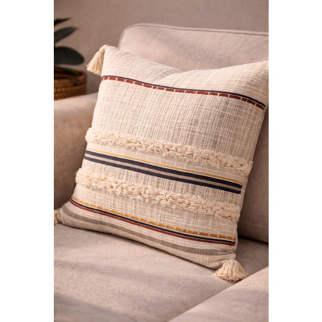 Add a soft, earthy charm to your space with this beautifully textured cushion cover. Designed with a blend of woven...