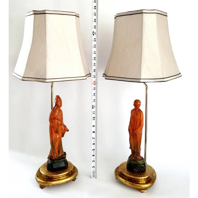 Offering a RARE vintage pair of ceramic figural table lamps by Borghese, circa 1960s. These Italian made lamps are signed...