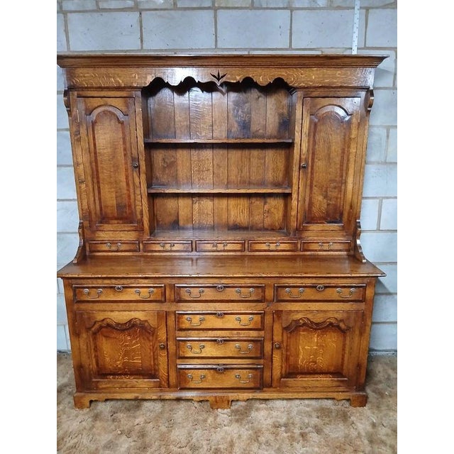 Victorian Style Ipswich Oak Dresser with Mahogany Crossbanding Material: Oak, Brass A substantial English oak dresser in...