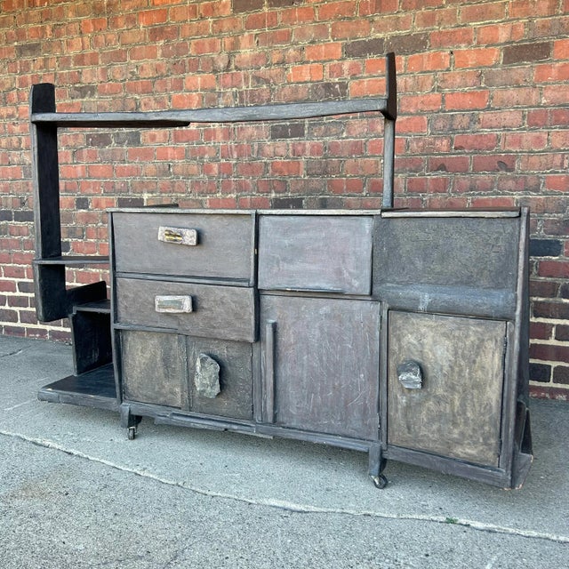 One of a kind studio made credenza by artist and designer Smokey Tunis. This unique brutalist credenza is constructed out...