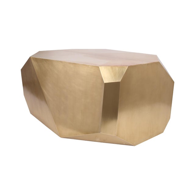 The Popova Coffee Table is inspired by the pop art movement. The faceted design is mantled in brass with a hand rubbed...