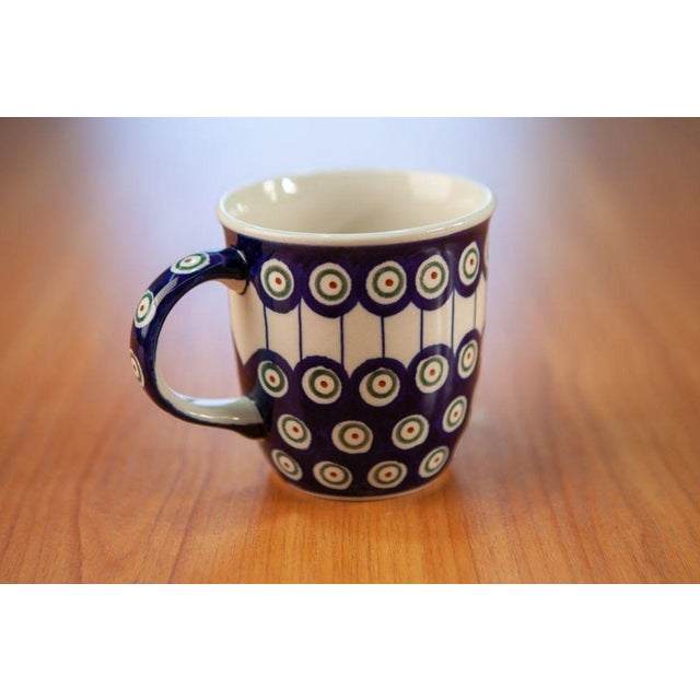 Hand-decorated and hand-formed mug with a profiled handle. It has an interesting light form, allowing us to enjoy hot and...