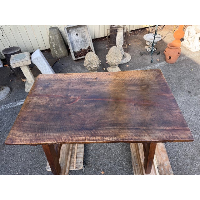 This is a lovely example of an 18th Century Spanish walnut table with unique lyre leg base. This table is a very solid...