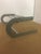 The Stelton Article 6010 is a wall-mounted, powder-coated aluminum hat shelf/hat rack with a rod for hanging clothes....