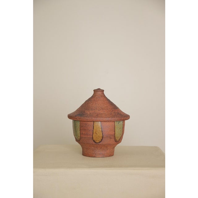 Handmade decorative pottery jar with lid.