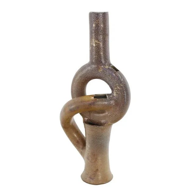 Nice unusual shape Mid-Century Modern era table vase. Perfect for a modern home.