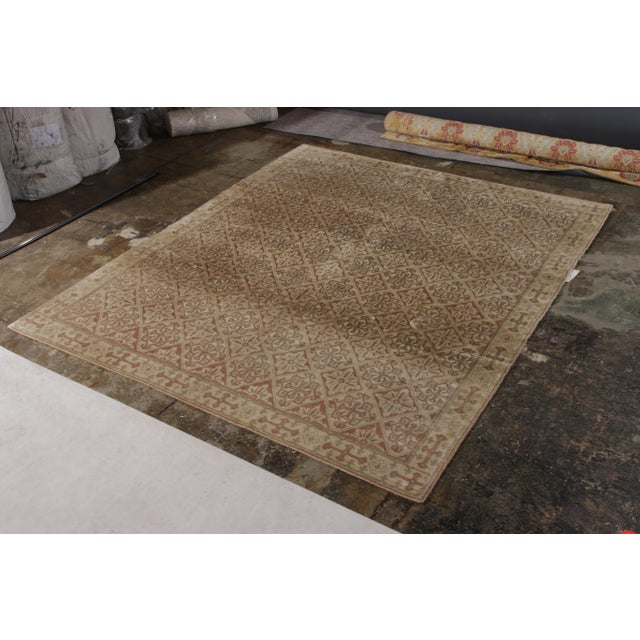 Hand-Knotted in a unique blend of all natural silk and wool, this transitional 8x10 rug is from the European rug...