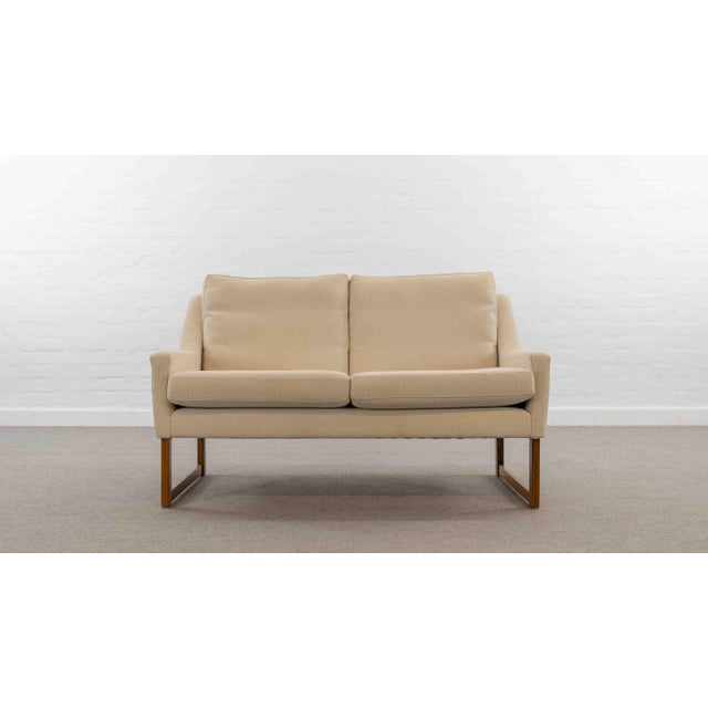 Classic-looking 2-seater sofa, designed in the 1960s by rudolf bernd glatzel for kill international. Upholstered in...