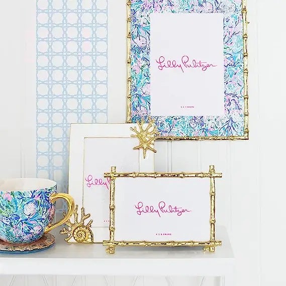 Go glam with this metal bamboo frame that's sized to showcase your favorite 4" x 6" photo. The easel stand paired with the...