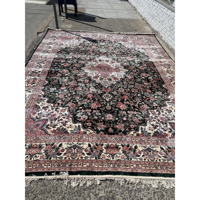 An elegant handmade vintage Chinese silk rug from the 1970s, distinguished by its refined floral composition and luxurious...